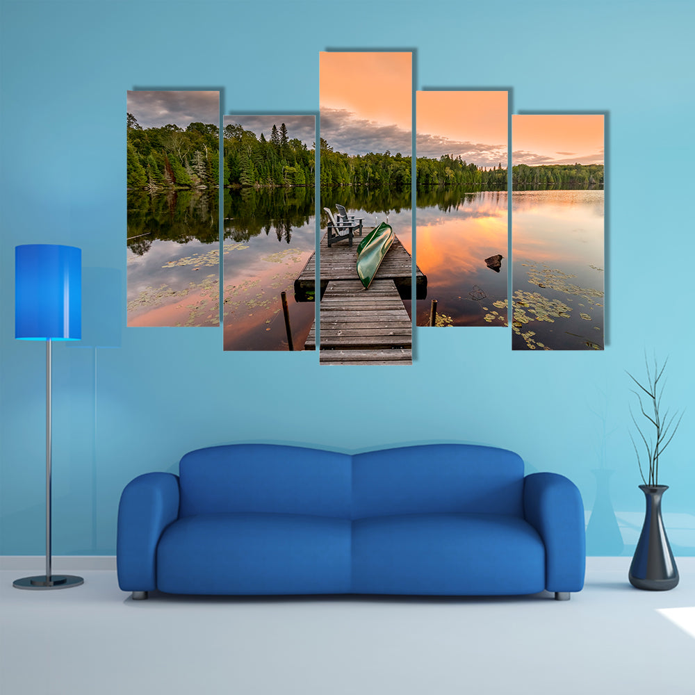 Green Canoe and Chairs on a Dock Next to a Lake at Sunset - Haliburton Highlands, Ontario, Canada multi panel canvas wall art