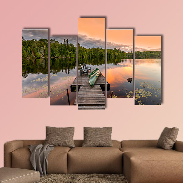 Green Canoe and Chairs on a Dock Next to a Lake at Sunset wall art