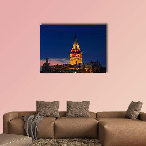 Illuminated Galata Tower in Istanbul, Turkey dark blue sky Multi panel canvas wall art