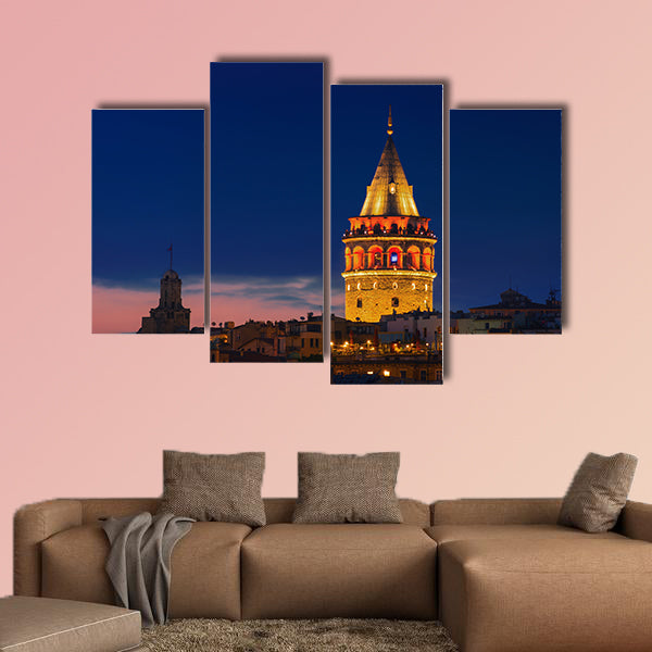 Illuminated Galata Tower in Istanbul, Turkey dark blue sky Multi panel canvas wall art