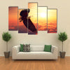 African Fish Eagle Flying High Above the Clouds with Sunrise Digital Artwork Multi Panel Canvas Wall Art