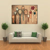 Assortment of beans in wooden spoon on teak wood Multi panel canvas wall art