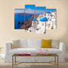 Panoramic scenic view of beautiful white houses and blue domes in Oia, Santorini, Greece Multi Panel Canvas Wall Art