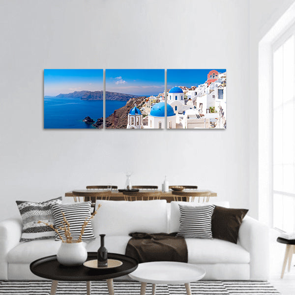 White houses and blue domes in Oia, Santorini, Greece Panoramic Canvas Wall Art