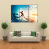 Surfer on Blue Ocean Wave Getting Barreled at Sunrise Multi Panel Canvas Wall Art