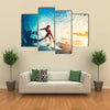 Surfer on Blue Ocean Wave Getting Barreled at Sunrise Multi Panel Canvas Wall Art