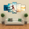 Surfer on Blue Ocean Wave Getting Barreled at Sunrise Multi Panel Canvas Wall Art