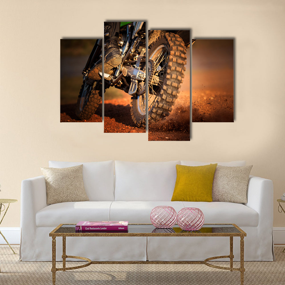 Action of enduro motorcycle on dirt track Multi panel canvas wall art