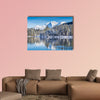 Idyllic winter wonderland with crystal clear mountain lake wall art