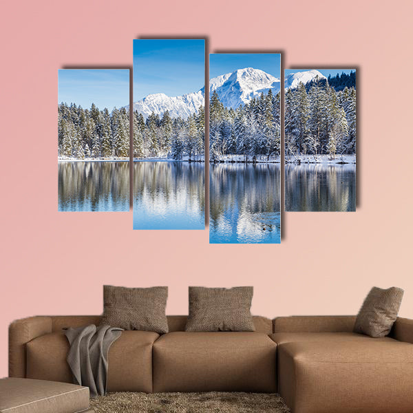 Idyllic winter wonderland with crystal clear mountain lake wall art