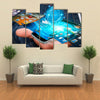 Businessman with modern mobile phone in his hand switching pictures Multi panel canvas wall art