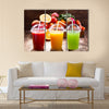 Fresh juices with fruits and vegetables on wooden background Multi panel canvas wall art