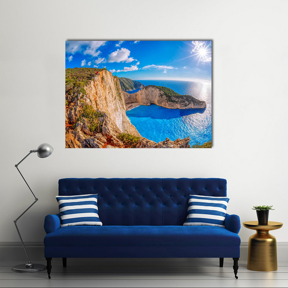 Navagio beach with shipwreck against sunset on Zakynthos Island in Greece Multi Panel Canvas Wall Art