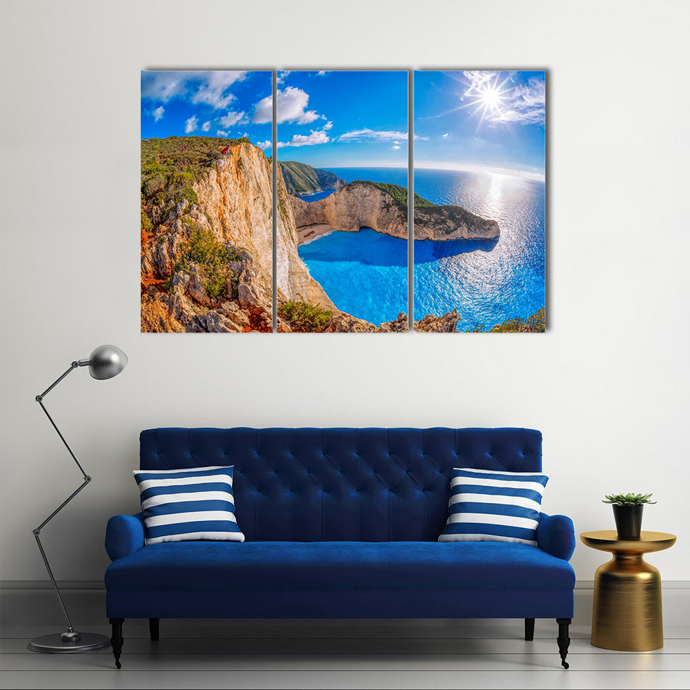 Navagio beach with shipwreck against sunset on Zakynthos Island in Greece Multi Panel Canvas Wall Art