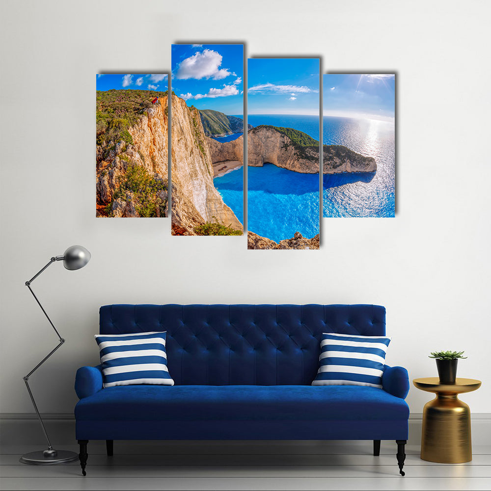 Navagio beach with shipwreck against sunset on Zakynthos Island in Greece Multi Panel Canvas Wall Art