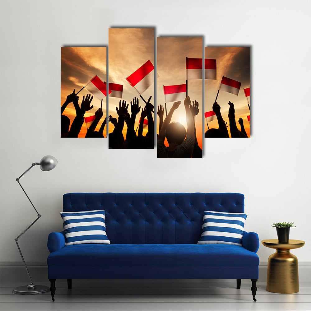 Silhouettes of People Holding the Flag of Indonesia Multi panel canvas wall art