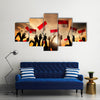 Silhouettes of People Holding the Flag of Indonesia Multi panel canvas wall art