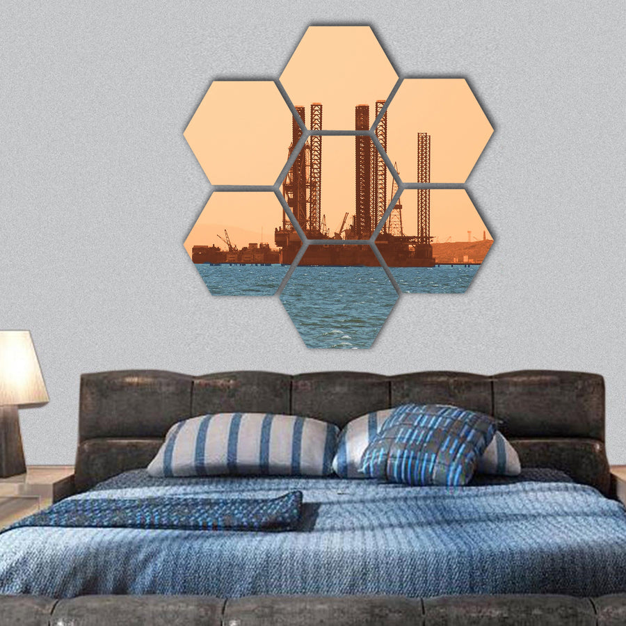 Oil rig during sunset in Baku, Azerbaijan in Caspian Sea hexagonal canvas wall art