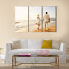 Happy Romantic Middle Aged Couple Enjoying Beautiful Sunset Walk on the Beach, Multi panel canvas wall art