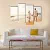 Happy Romantic Middle Aged Couple Enjoying Beautiful Sunset Walk on the Beach, Multi panel canvas wall art