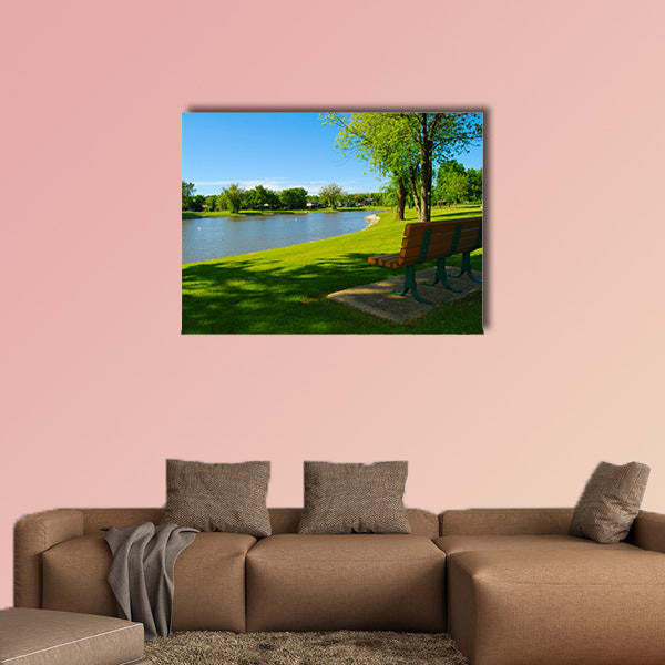 Park bench overlooking a lake multi panel canvas wall art