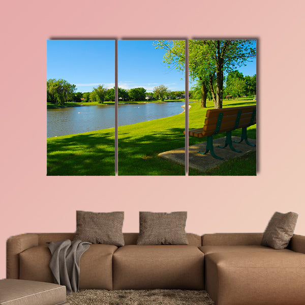 Park bench overlooking a lake multi panel canvas wall art