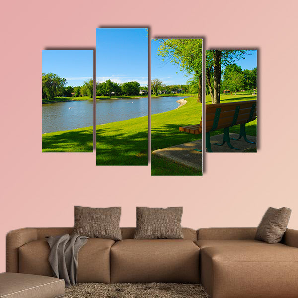 Park bench overlooking a lake multi panel canvas wall art