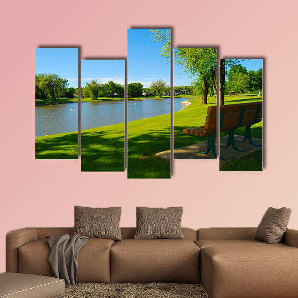 Park bench overlooking a lake multi panel canvas wall art