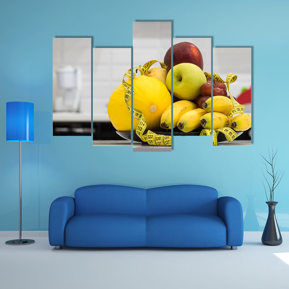 Plate with measuring tape and fruits on the table, Vegetarian diet for weight loss, Multi panel canvas wall art