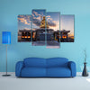 The Sunrise Behind The Statue Of Buddhist In Front Of A Temple In South Korea Multi Panel Canvas Wall Art