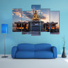 The Sunrise Behind The Statue Of Buddhist In Front Of A Temple In South Korea Multi Panel Canvas Wall Art