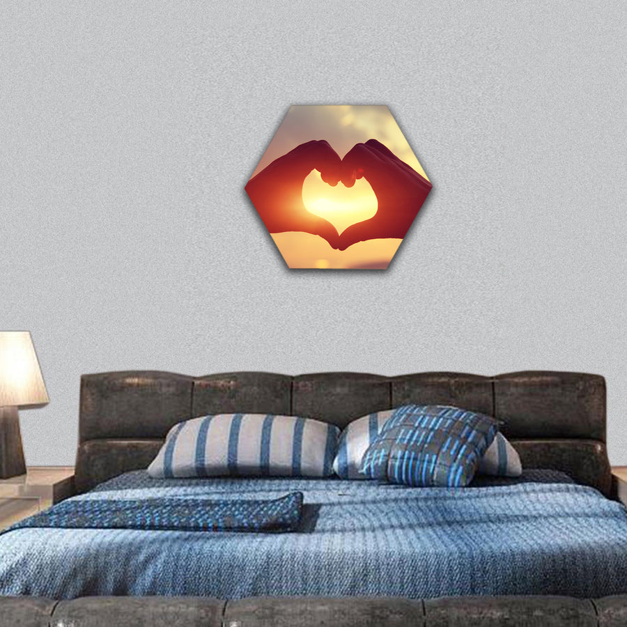 Heart shape making of hands hexagonal canvas wall art