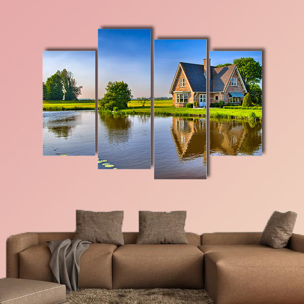 Red bricks house in countryside near the lake multi panel canvas wall art