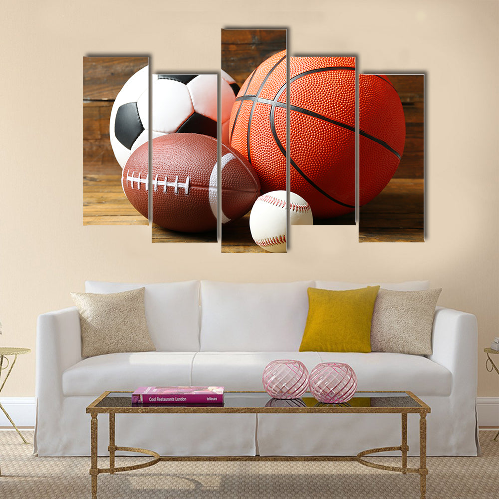 Sports balls on wooden background Multi panel canvas wall art
