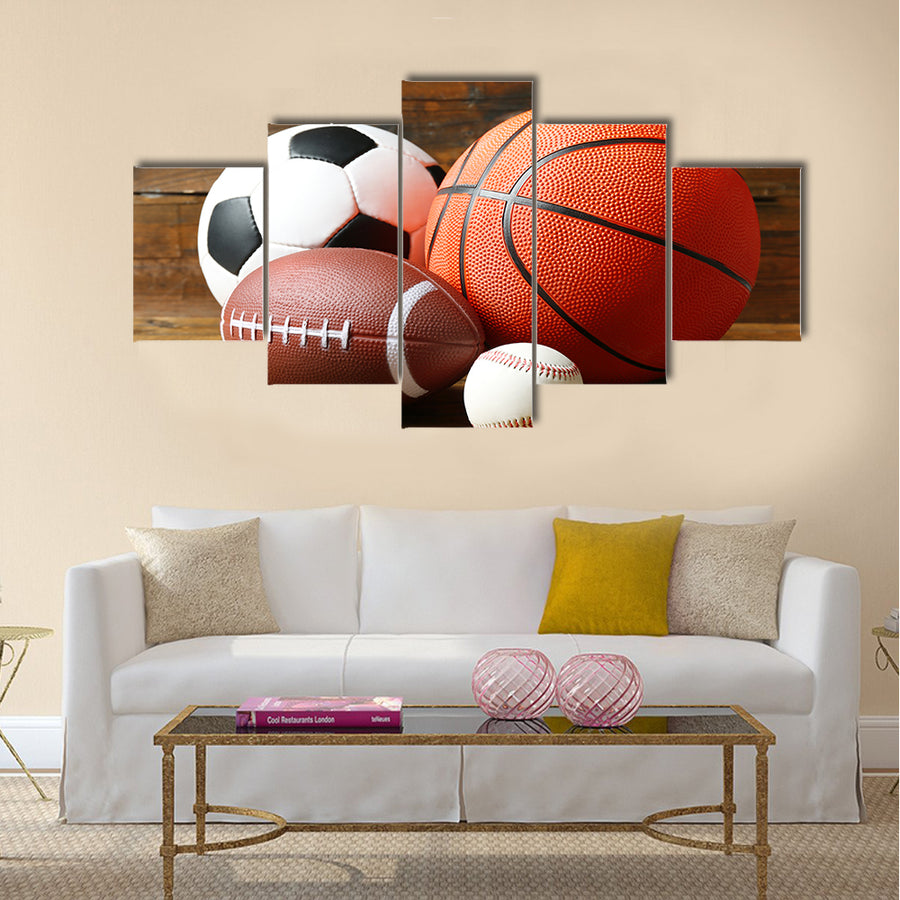 Sports balls on wooden background Multi panel canvas wall art