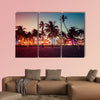 Ocean Drive Street with illuminated buildings, South Beach, Florida multi panel canvas wall art