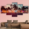 Ocean Drive Street with illuminated buildings, South Beach, Florida multi panel canvas wall art