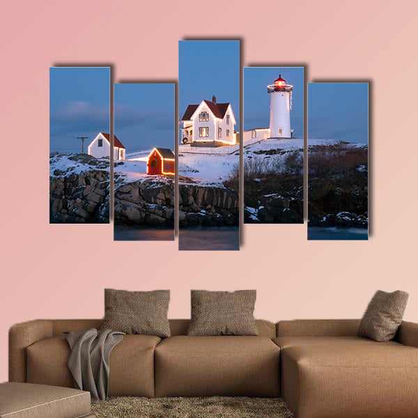 Southern Maine's Nubble lighthouse lit at dusk during the holidays