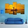 Fisherman of Bangpra Lake in action when fishing, Thailand multi panel canvas wall art