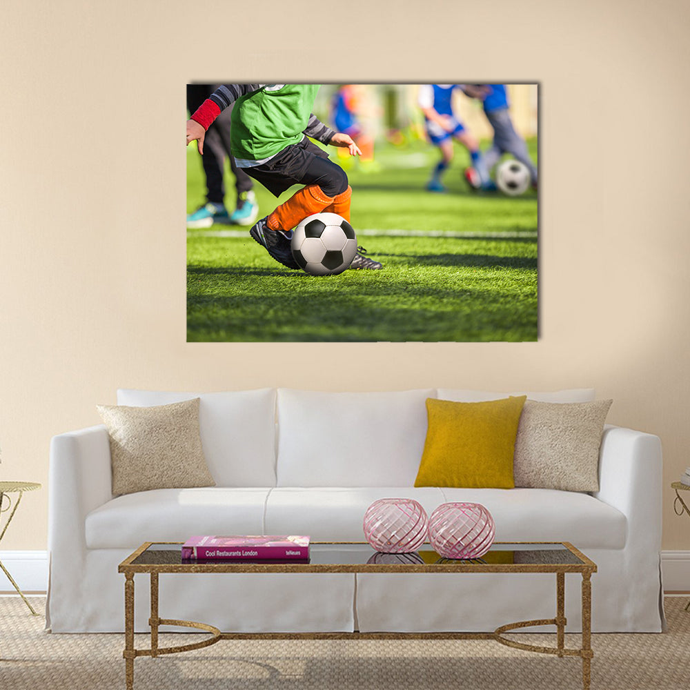 Football training for children Multi panel canvas wall art