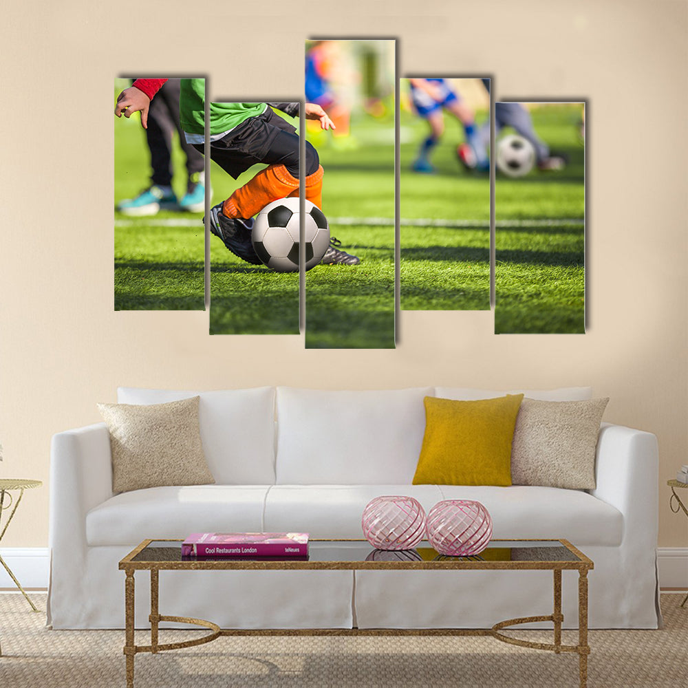 Football training for children Multi panel canvas wall art