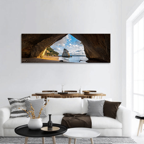View of Cathedral Cove at sunrise panoramic canvas wall art.