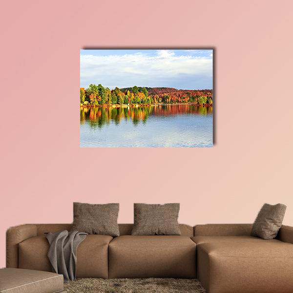 Forest of colorful autumn trees reflecting in calm lake Multi panel canvas wall art