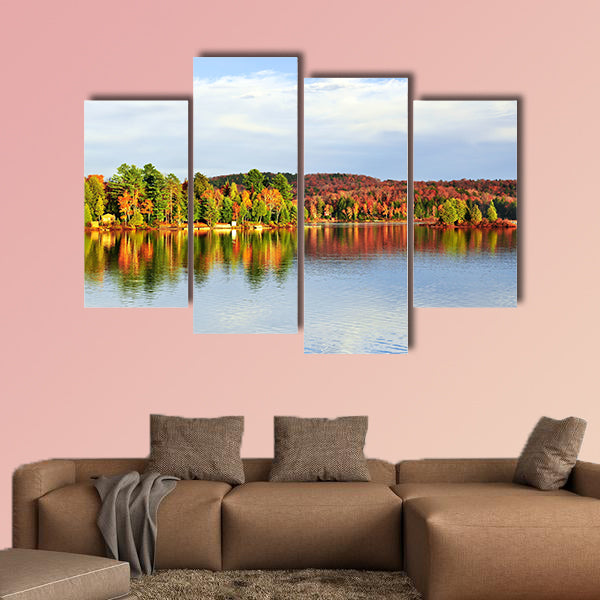 Forest of colorful autumn trees reflecting in calm lake Multi panel canvas wall art