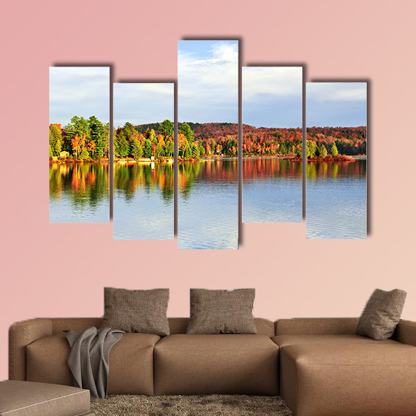 Forest of colorful autumn trees reflecting in calm lake Multi panel canvas wall art