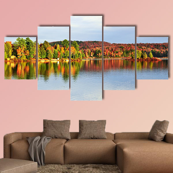 Forest of colorful autumn trees reflecting in calm lake Multi panel canvas wall art