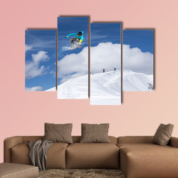 Flying snowboarder on mountains. Extreme winter sport Multi panel canvas wall art