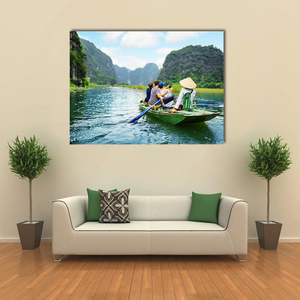 Tourists traveling in boat along the Dong River and taking picture  Multi panel canvas wall art