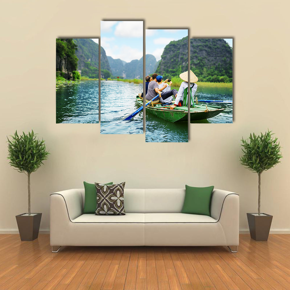 Tourists traveling in boat along the Dong River and taking picture  Multi panel canvas wall art