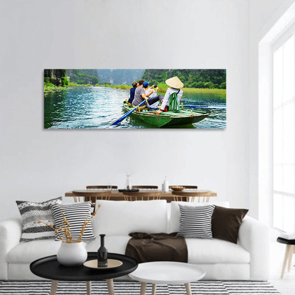 Tourists traveling in boat in Ngo Dong River ,Vietnam panoramic canvas wall art